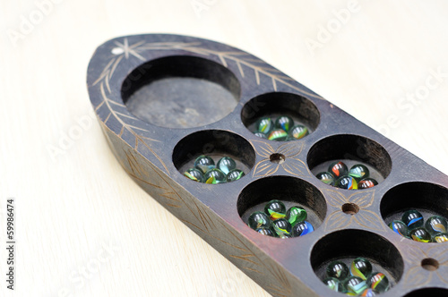 wooden congkak board, selective DOF