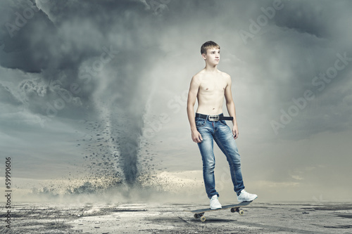 Teenager on skateboard © Sergey Nivens