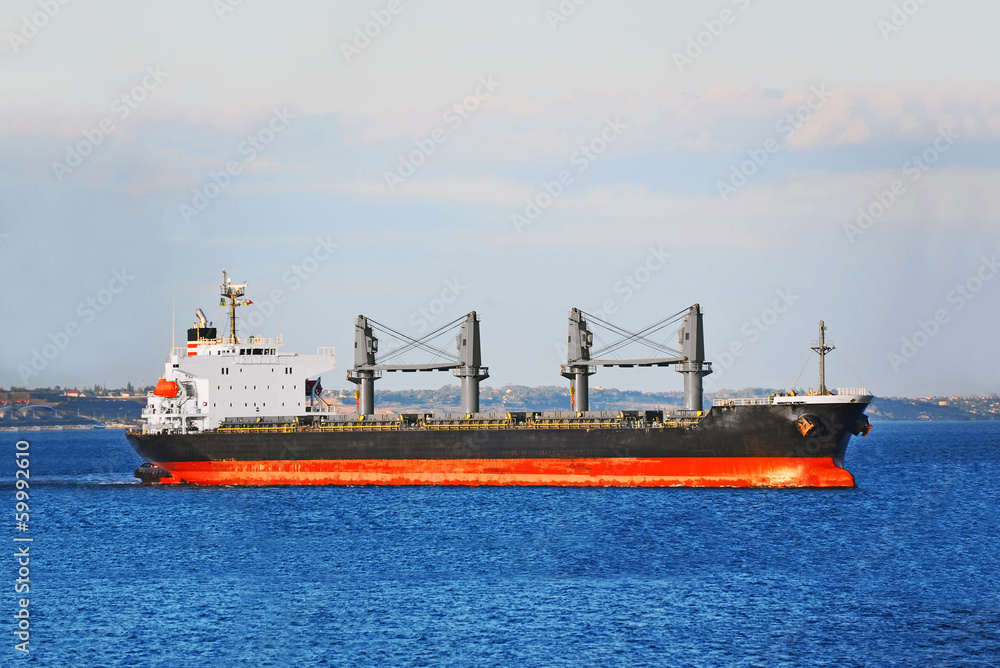 Bulk cargo ship in Odessa harbor quayside