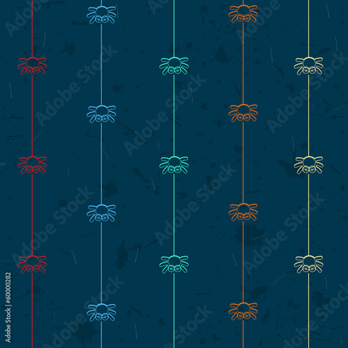 Colored spiders on a dark grunge background.