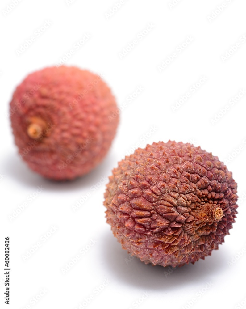 Litchi (Litchi chinensis) placed on the white background. Litchi (Litchi chinensis) placed on the white background.