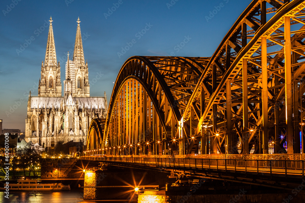 Hohenzollern Bridge and Cologne Cathedral at dusk