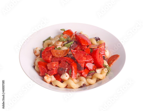 Cold pasta salad with tomatoes, olives, basil, pepperoni and moz
