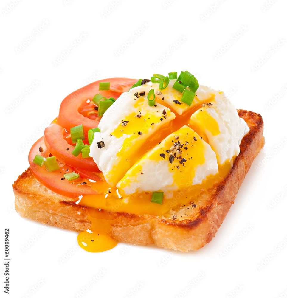 Poached eggs on toast with tomato and pepper foto de Stock | Adobe Stock