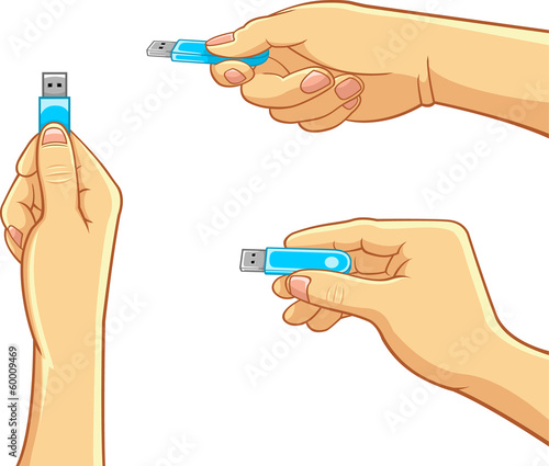 Computer - Hand Holding a USB Flash Drive