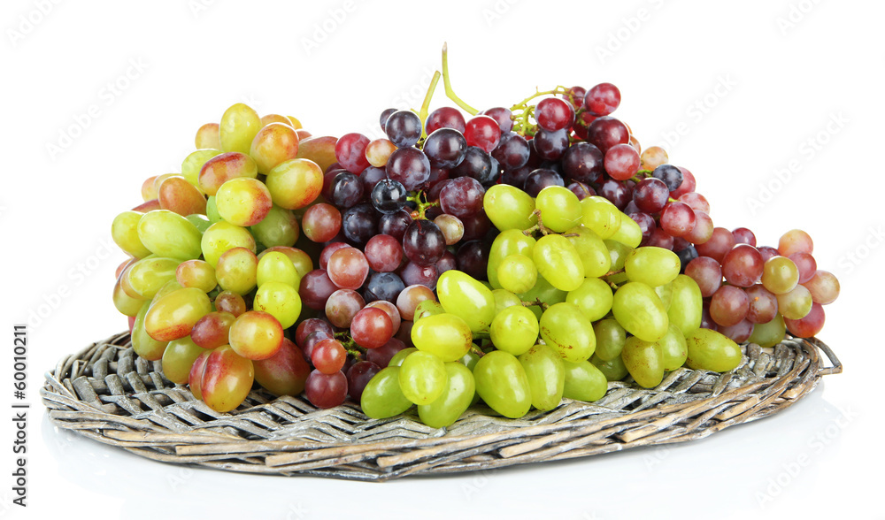 Fresh grape on wicker mat isolated on white Fresh grape on wicker mat isolated on white