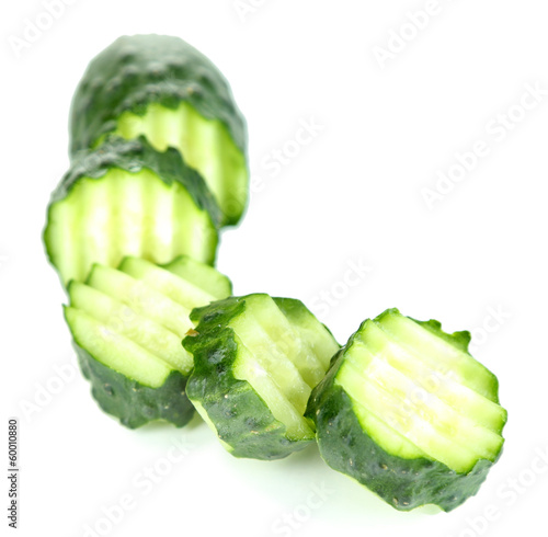 Sliced cucumber, isolated on white photo