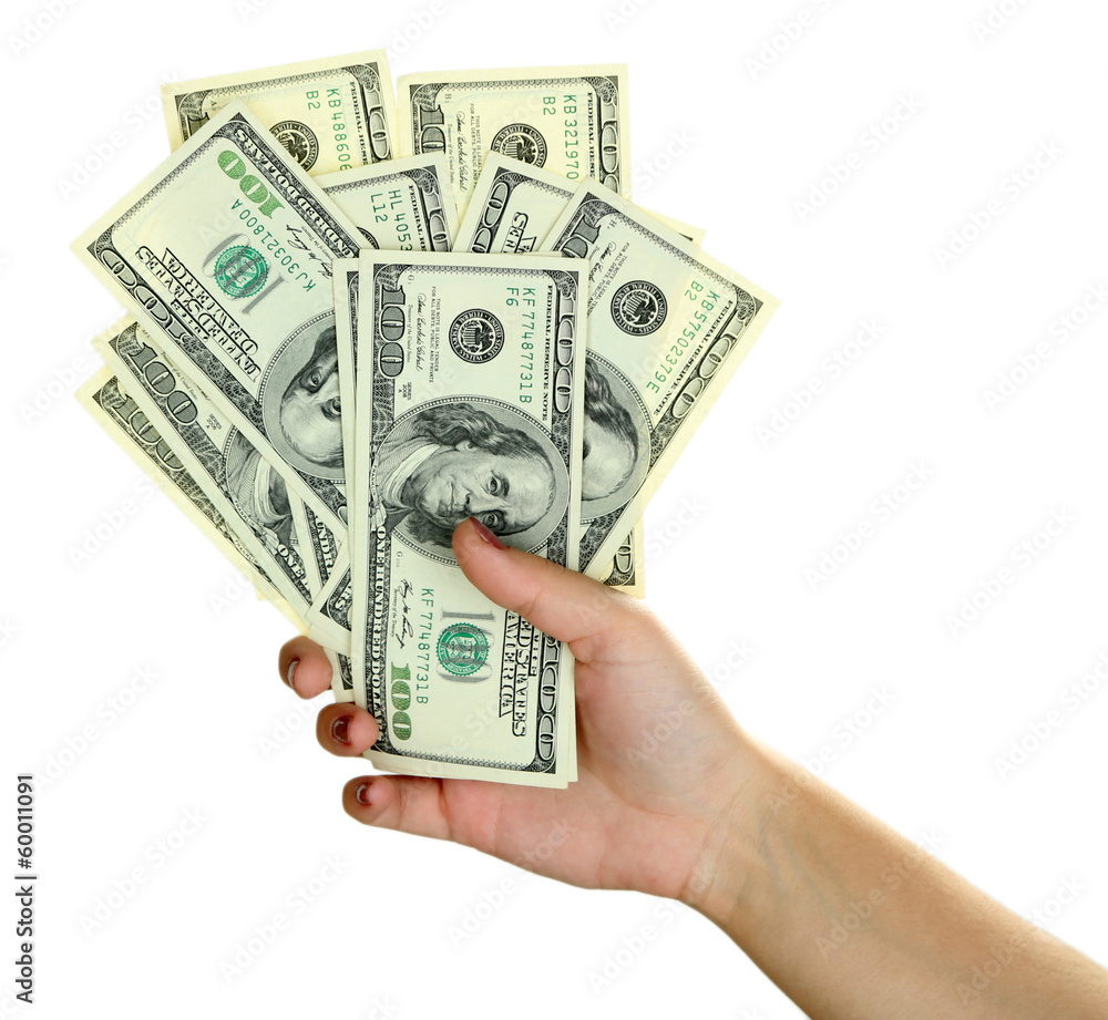 Female hand with dollars close up isolated on white Female hand with dollars close up isolated on white