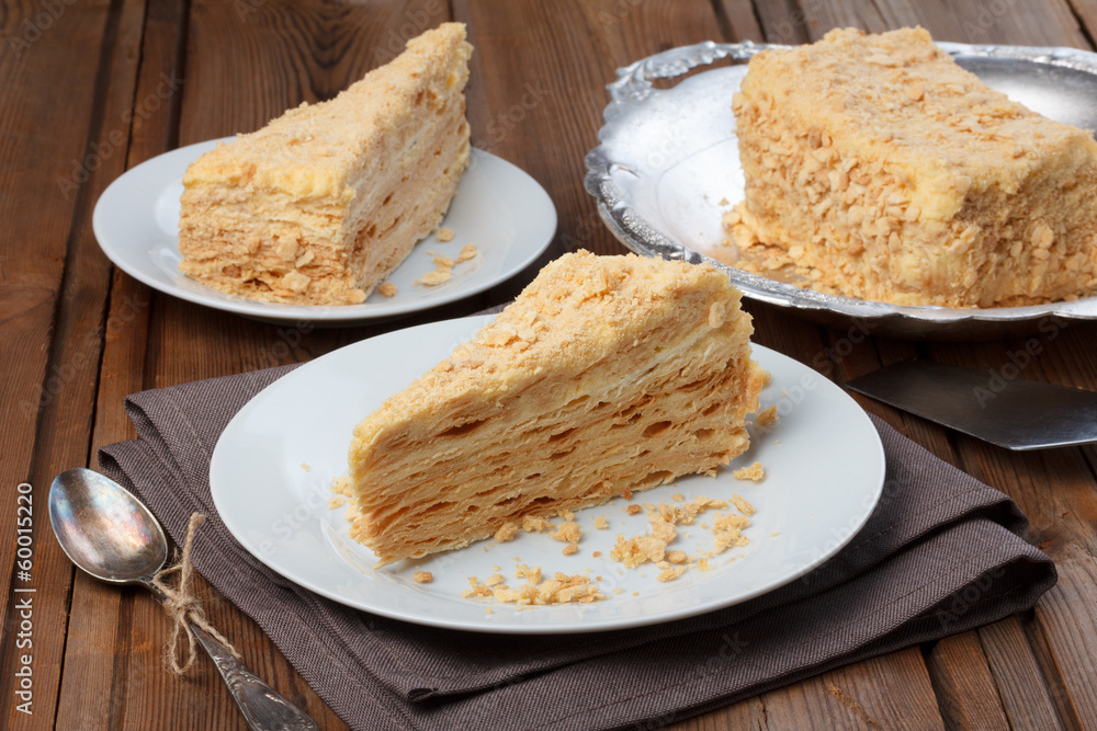 Layer cake on wooden table Layer cake on wooden table