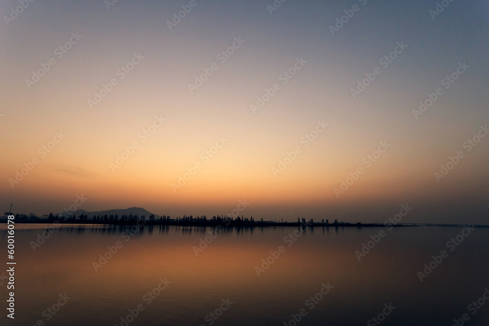 The view of lake at sunset
