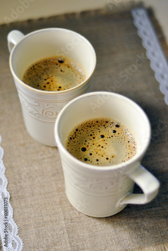 Two mugs of aromatic coffee