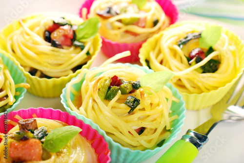 pasta nests baked in silicone muffin molds