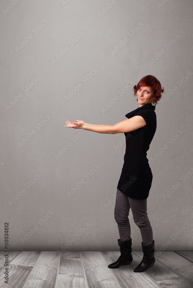 Pretty woman presenting an empty copy space Pretty woman presenting an empty copy space