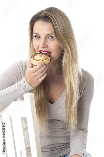 Young Woman Eating a Toasted Crumpet