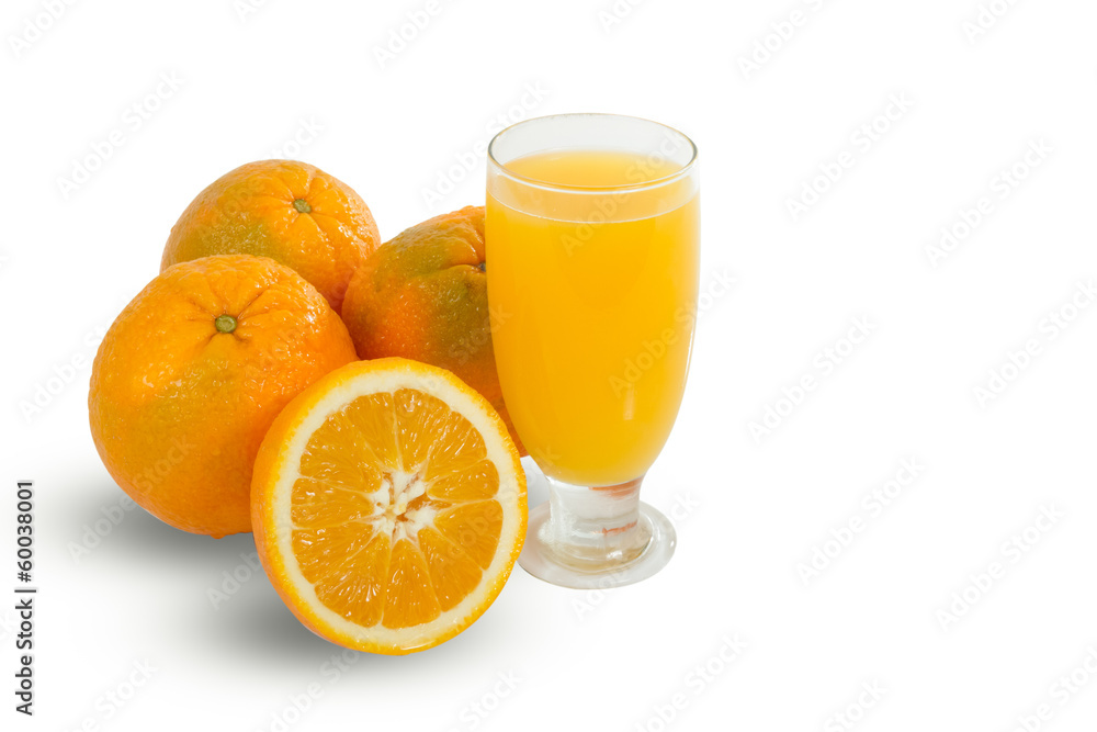 Glass of fresh orange juice with sliced oranges on white backgro Glass of fresh orange juice with sliced oranges on white backgro