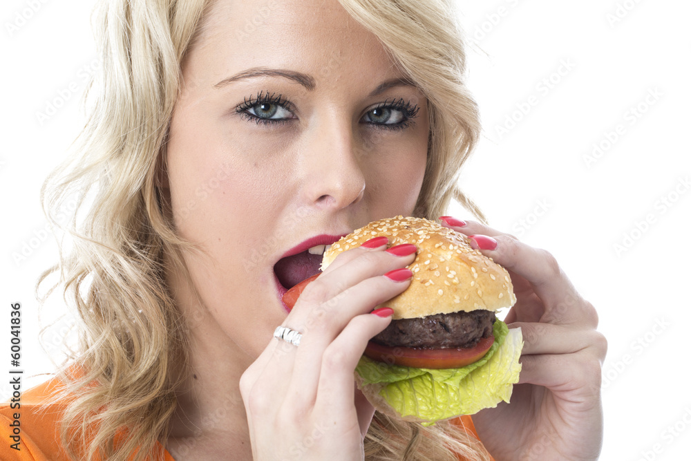 Young Woman Eating a Beef Burger