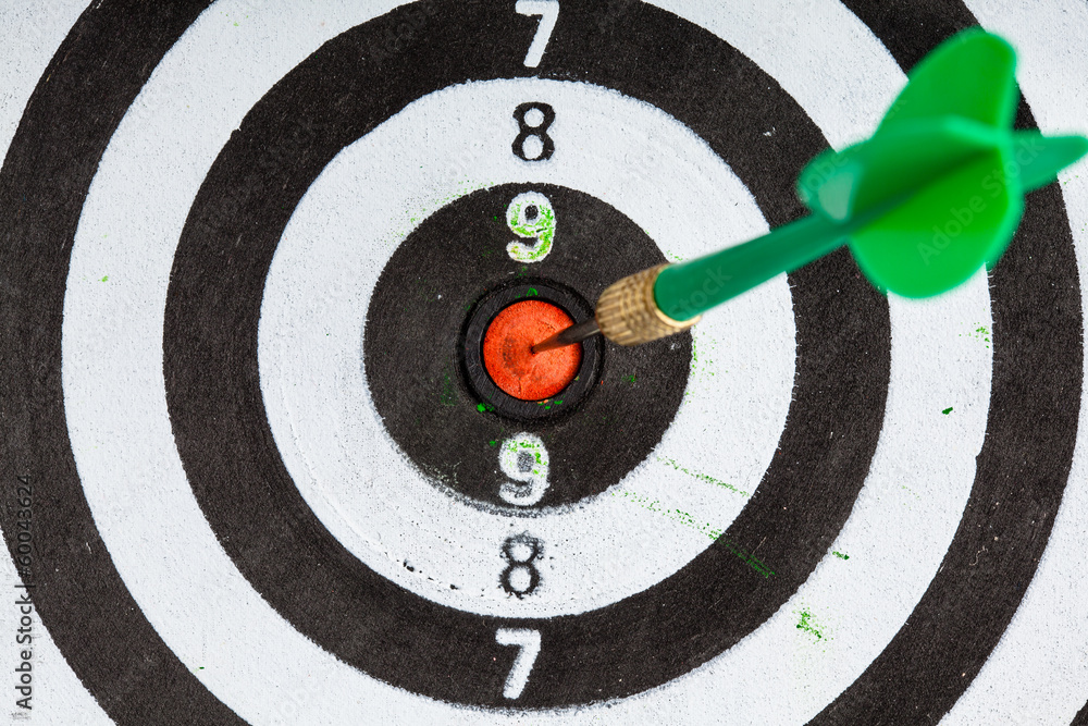 Bullseye. Black and white target with dart as sport background Bullseye. Black and white target with dart as sport background