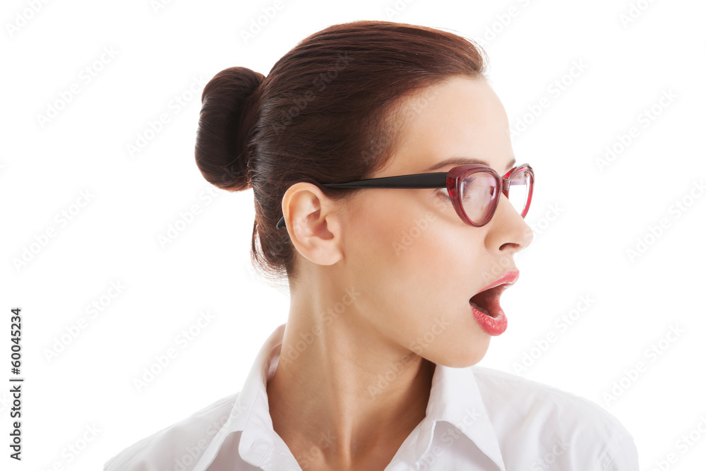 Profile of shocked, surprised woman in eyeglasses. Profile of shocked, surprised woman in eyeglasses.