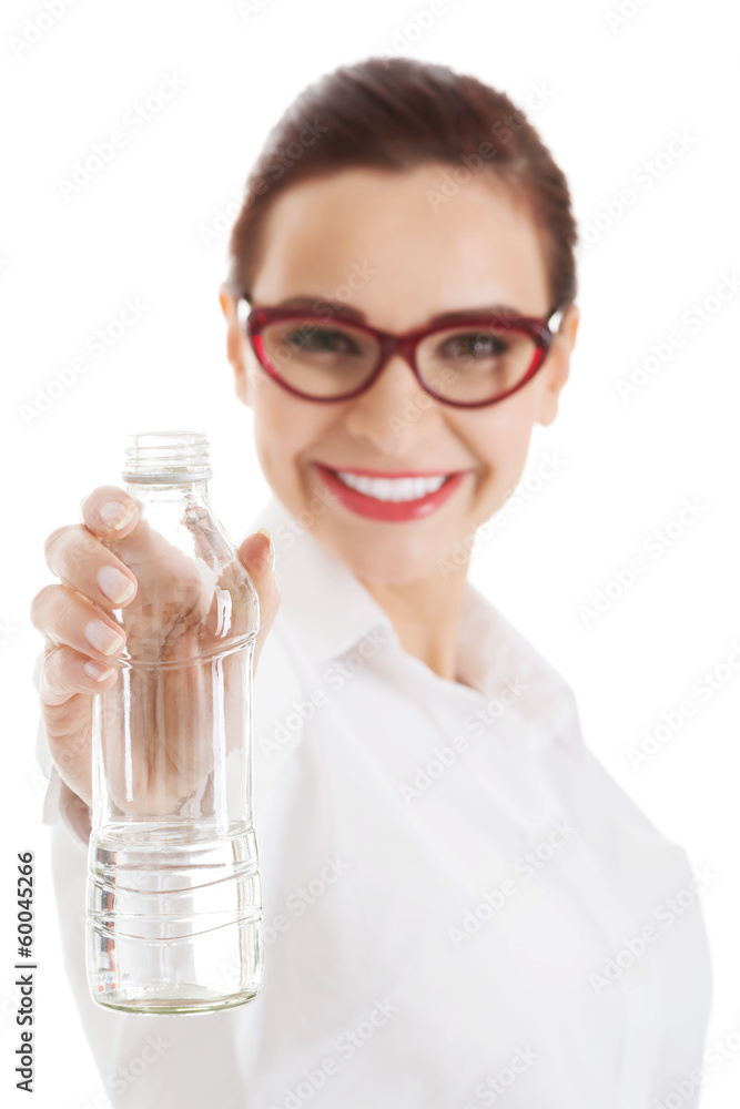 Beautiful business woman with plastic bottle of water. Beautiful business woman with plastic bottle of water.
