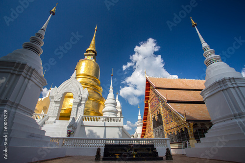 The golden pagoda at Wat Suan Dok temple in Chiang Mai, Thailand photo