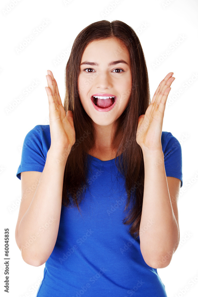 Young casual woman student expresses shock, surprise. Young casual woman student expresses shock, surprise.