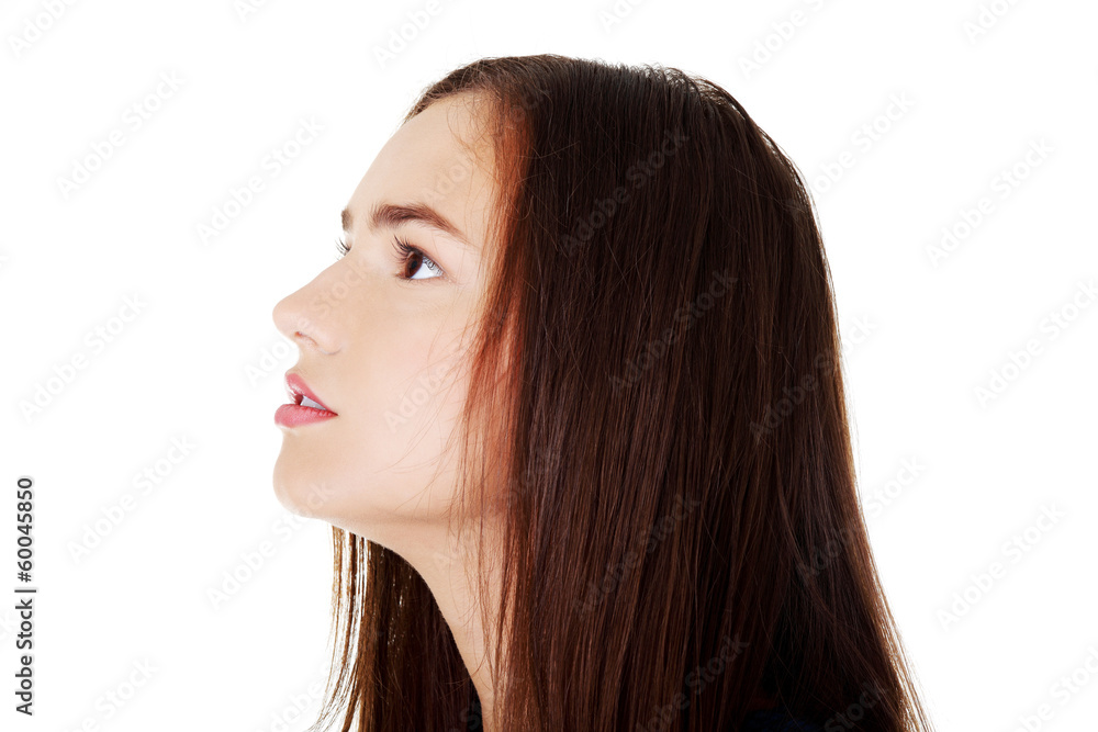 Profile of beautiful woman looking up. Profile of beautiful woman looking up.