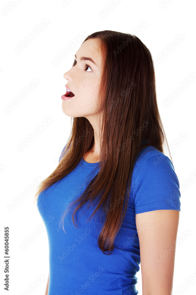 Young casual woman student expresses shock, surprise. Young casual woman student expresses shock, surprise.