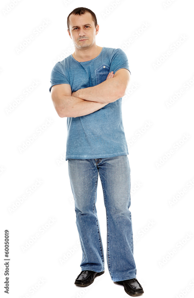 A casual dressed caucasian man with arms folded A casual dressed caucasian man with arms folded