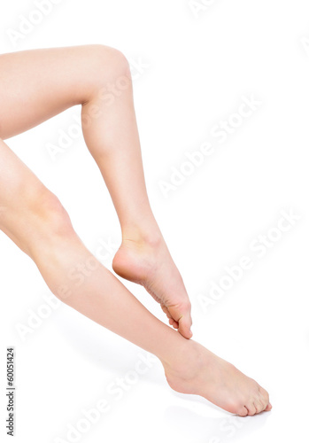 beautiful legs of young woman over white © Khorzhevska