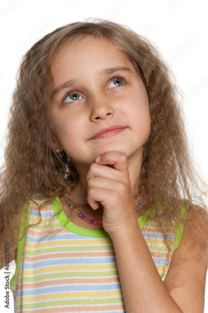 Closeup portrait of a  pensive little girl