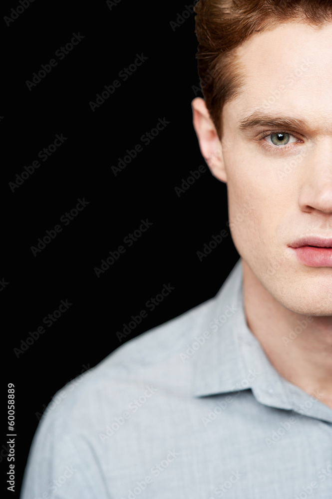 Obraz premium Half face portrait of a smart guy