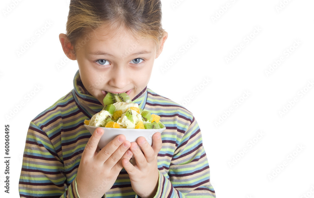 beautiful girl eats a dessert of ice cream and kiwi beautiful girl eats a dessert of ice cream and kiwi
