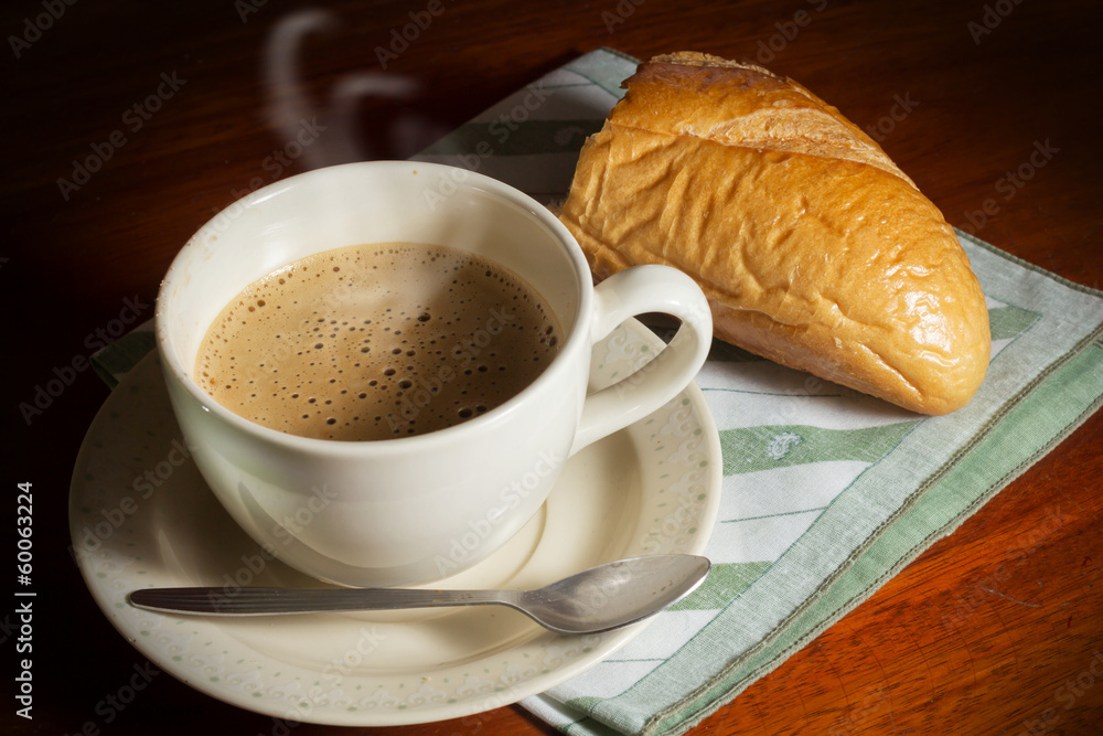 Cappuccino coffee with bread. Cappuccino coffee with bread.