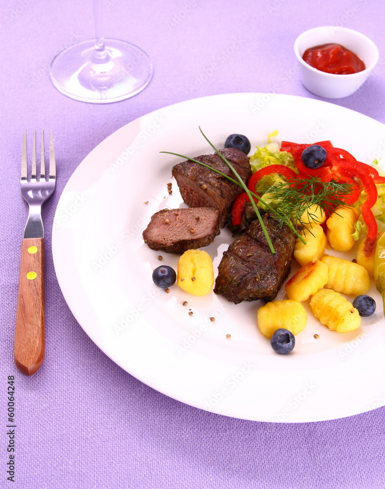 Lamb steak with gnocchi, vegetable and sauce Lamb steak with gnocchi, vegetable and sauce