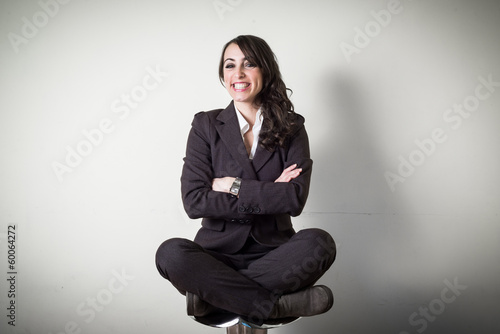 meditating beautiful young businesswoman