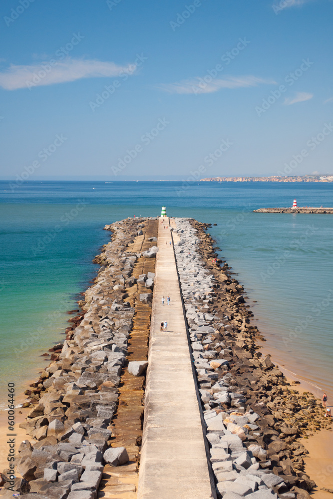 Breakwater in Algarve beach, Portugal