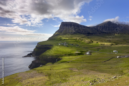 Faroe Islands, remote village on steep cliffs overlooking the se