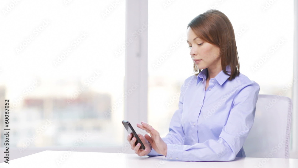 busy businesswoman with smartphone in office busy businesswoman with smartphone in office