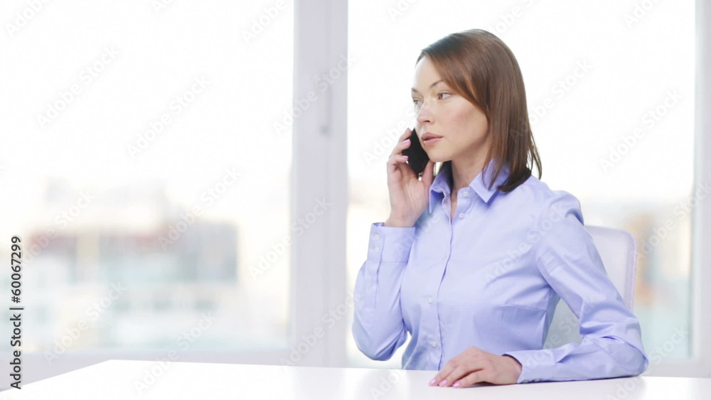 busy businesswoman with smartphone in office busy businesswoman with smartphone in office