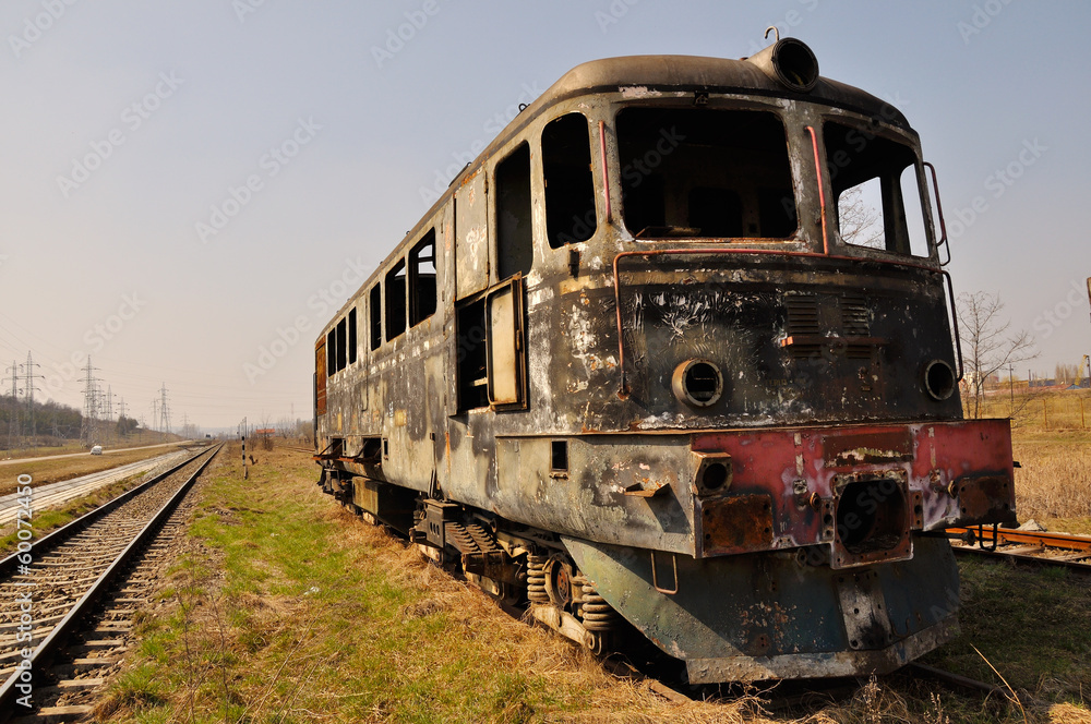 locomotive burnt and abandoned on rails locomotive burnt and abandoned on rails