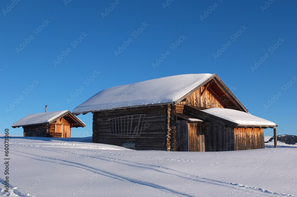 Typical wooden challet in the Dolomites Typical wooden challet in the Dolomites