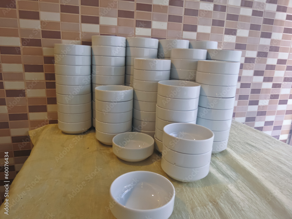 A stack of plates for the first A stack of plates for the first