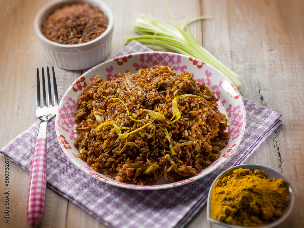 red rice with curry and leek, selective focus