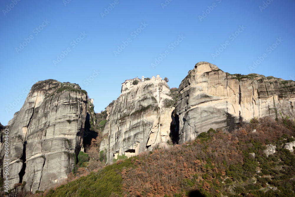 greek orthodox church and monastery on a pinnacle of rock in meteora	