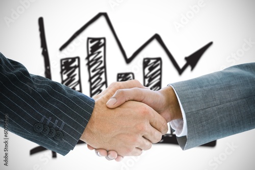 Composite image of business handshake