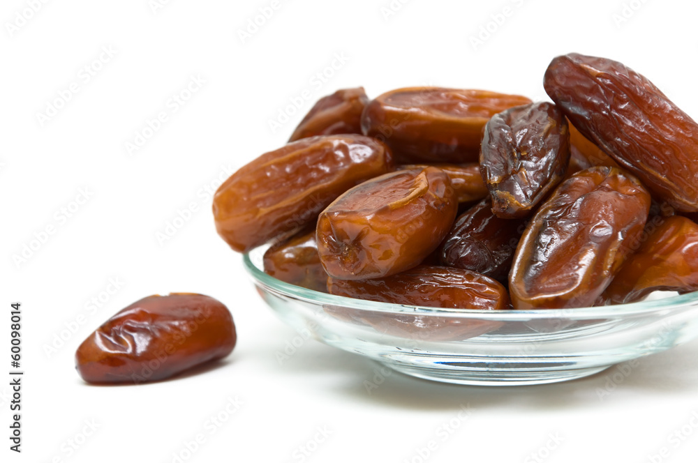 juicy figs in a glass bowl on white background juicy figs in a glass bowl on white background