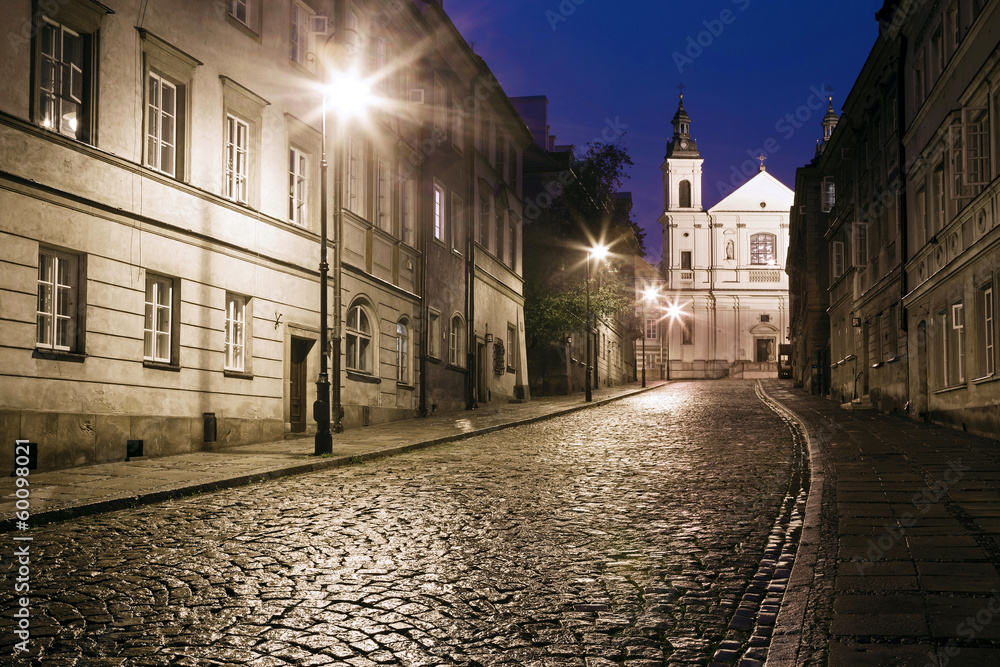 The street of the old town in Warsaw at night