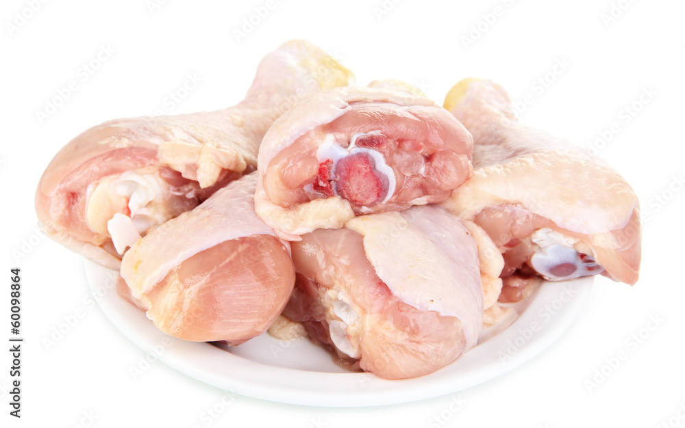 Raw chicken legs isolated on white