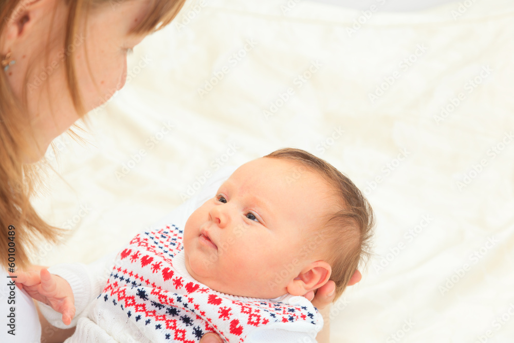 mother enjoying time with newborn daughter mother enjoying time with newborn daughter