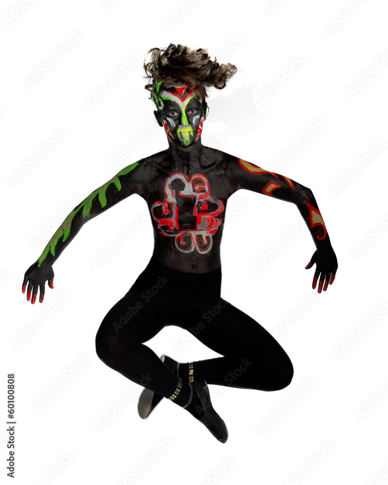 The girl in an unusual dance image, painted in dark colors The girl in an unusual dance image, painted in dark colors